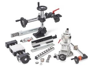 Adjusting, moving with guides, spindles and ball rollers